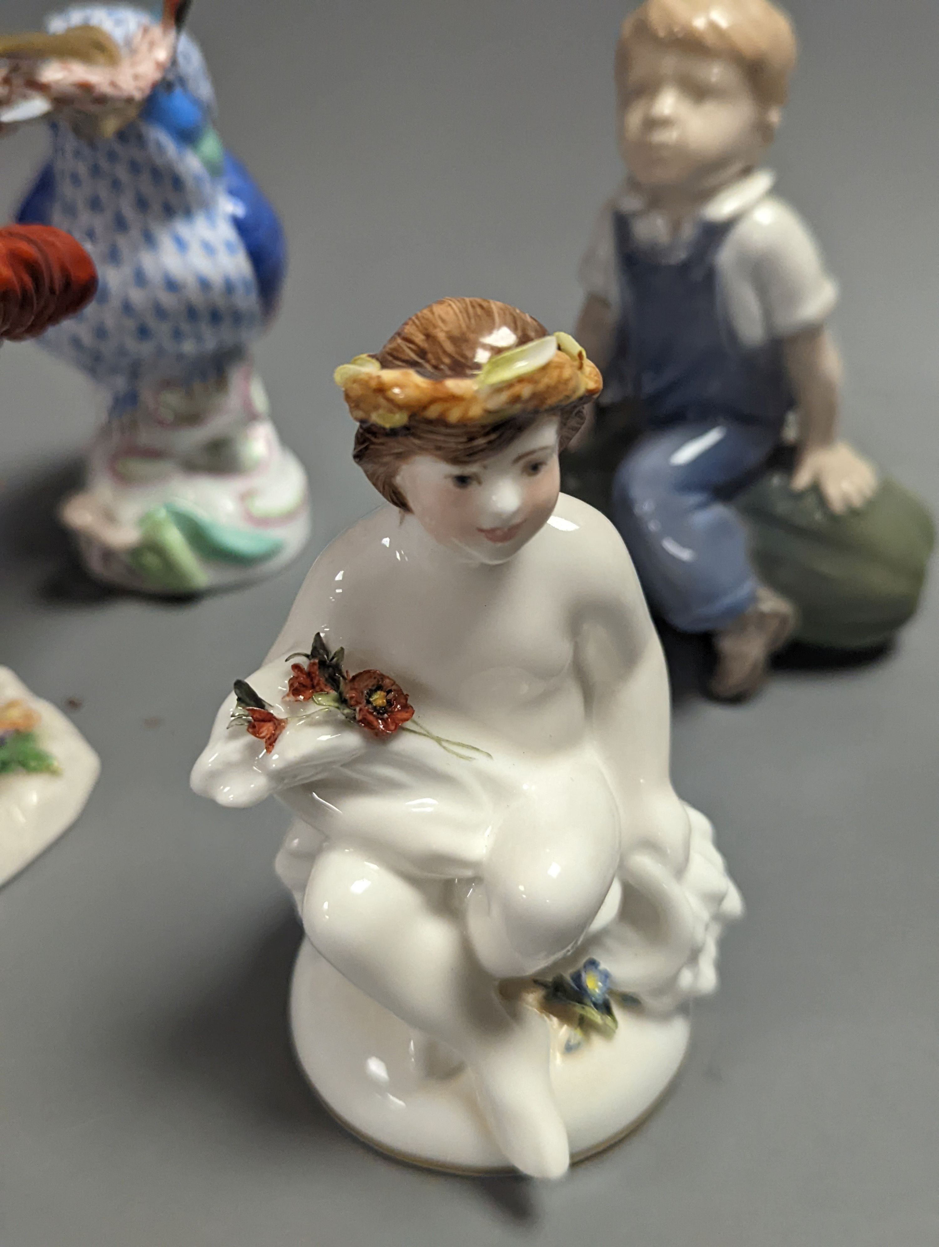 A group of Derby, Royal Worcester, Royal Copehagen and Herend models including a figure group, tallest 16.5cm (6)